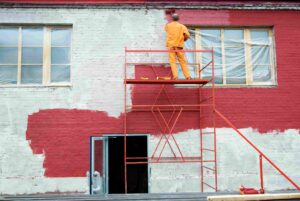 ravalement de façade en rouge dans le val d'oise
